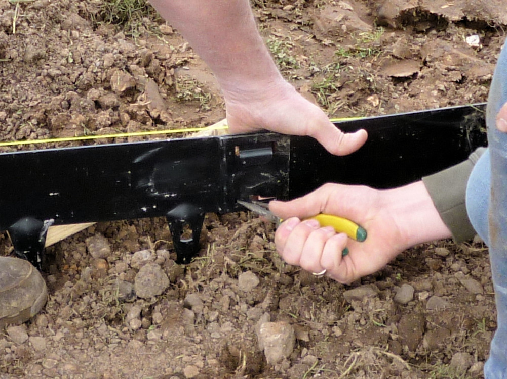 use pliers to pull through locking tabs