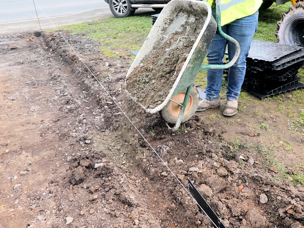 place concrete in trench