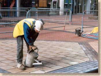 pouring a slurry into the joints pouring a slurry into the joints