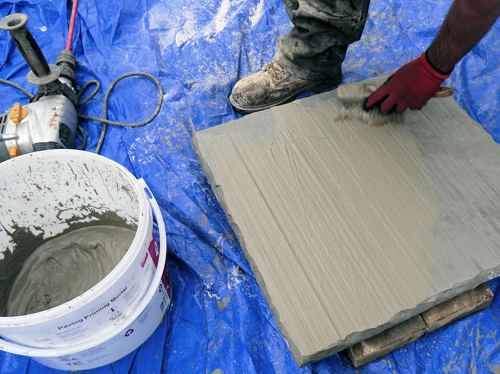 primer applied to underside of paver primer applied to underside of paver